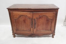 19th century French fruitwood buffet, the rectangular top with rounded front corners, moulded