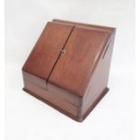 Late 19th/early 20th century mahogany desk tidy, the two doors opening to reveal compartmented