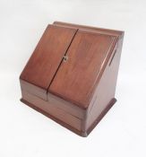 Late 19th/early 20th century mahogany desk tidy, the two doors opening to reveal compartmented