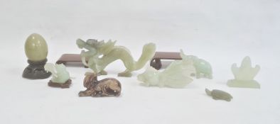 Collection of Chinese jade carvings to include carp, elephant, tortoise, dragon etc, carved brown