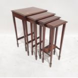 Edwardian quartetto nest of tables, the rectangular tops with satinwood stringing and banded
