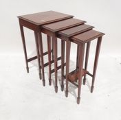 Edwardian quartetto nest of tables, the rectangular tops with satinwood stringing and banded