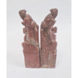Pair Chinese carved soapstone seals, each surmounted by two male figures, 12cm high
