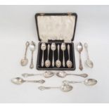 Nine various sterling silver teaspoons with floral decorated handles and a set of six silver