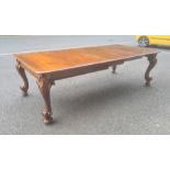 Late Victorian mahogany extending dining table, the rectangular top with rounded corners, moulded
