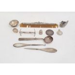 Assorted silver items to include a silver-mounted comb, a salt, a thimble, a duck-shaped silver-