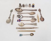 Assorted plated and silver souvenir spoons, various thimbles one marked Mexico, propelling pencils