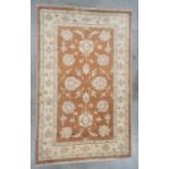 Modern peach ground runner with foliate decoration, stepped border, 153cm x 96cm