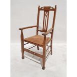 20th century oak carver chair in the Arts & Crafts manner