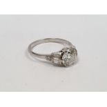 Solitaire diamond ring, the central brilliant cut diamond approx 1.4ct, the shoulders set with three