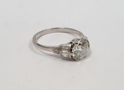 Solitaire diamond ring, the central brilliant cut diamond approx 1.4ct, the shoulders set with three