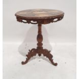 African-style walnut and marquetry inlaid centre table, the top inset with various African and other