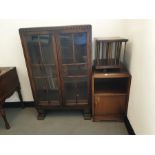 Early 20th century oak bookcase, a bedside cabinet and a table-top revolving bookcase (3)