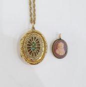 9ct gold oval locket decorated with seedpearls and turquoise, on a gold-coloured chain and a gold