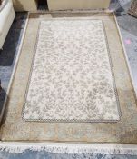 Modern cream ground rug with leaf decoration, gold borders, 280cm x 202cm Condition ReportPicture of