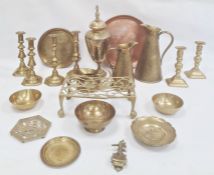 Large quantity of brassware to include old rectangular pieced trivet, table candlesticks, jugs,