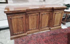 19th century mahogany breakfront sideboard with two drawers above four cupboard doors, on plinth