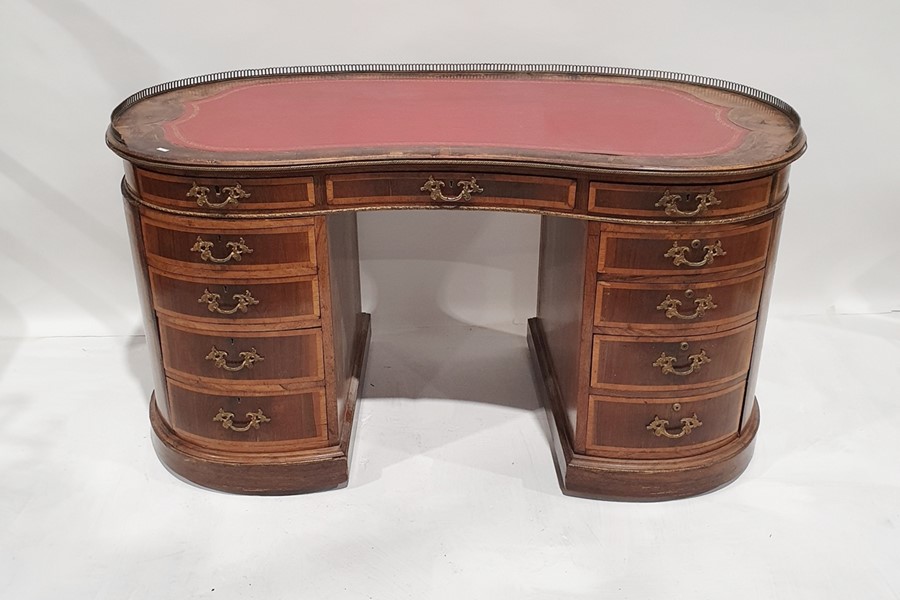 Early 20th century French-style ormolu-mounted rosewood kidney-shaped writing desk having brass
