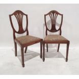 Set of four Hepplewhite-style 19th century dining chairs with shield-shaped backs, with wheatsheaf