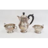 Three-piece silver tea set by Marson & Jones, Birmingham 1932 of circular form with bead borders