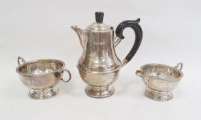 Three-piece silver tea set by Marson & Jones, Birmingham 1932 of circular form with bead borders