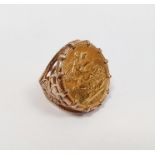 Elizabeth II gold sovereign 1958 in gold-coloured ring mount, total weight approx 13.2g