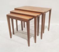 Mid-century designer, possibly Danish or Scandinavian, teak nest of three tables, each with