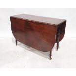 19th century mahogany drop-leaf table, the rectangular top with rounded corners on turned supports