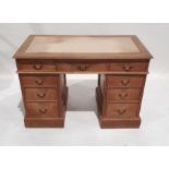 20th century oak pedestal desk with nine assorted drawers, on plinth base (Made mid 20th century