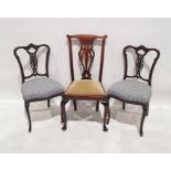Pair of bedroom chairs with carved and pierced backsplats, blue upholstered seats, on cabriole