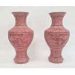Pair Chinese cinnabar lacquer vases, inverse baluster shaped with panels of figures in landscape,