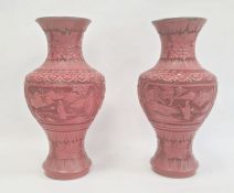 Pair Chinese cinnabar lacquer vases, inverse baluster shaped with panels of figures in landscape,