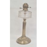 Old brass oil lamp with cut glass drum shaped well on reeded column and gadrooned circular base,