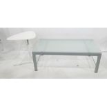 Modern coffee table of rectangular design with central perspex panel, in brushed polished metal