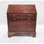 Georgian walnut bureau, the fall opening to reveal fitted interior, four graduated drawers, on