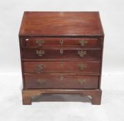 Georgian walnut bureau, the fall opening to reveal fitted interior, four graduated drawers, on