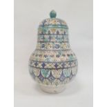 Isnik covered vase, baluster-shaped with pierced cover, rows of lozenge and stylised flowerheads