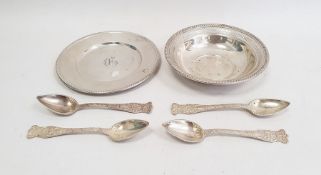 A set of four sterling teaspoons, marked to finial 'VMC 1105' and sterling to reverse, 3.5ozt.