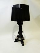 Kartell black plastic table lamp and shade, having tripod scroll base, 76cm high Condition