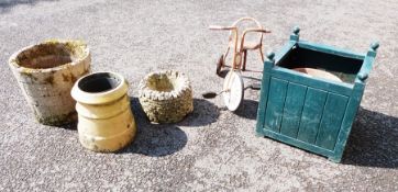 Green plastic square jardiniere, chimney pots, jardiniere, child's tricycle, terracotta planter