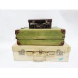 Vintage canvas suitcase with leather corners, the interior fitted for shoes, a second vintage