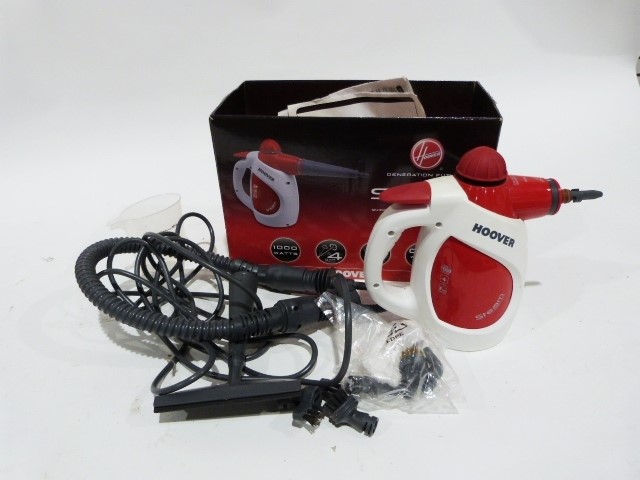 Hoover steam cleaner and a sewing machine (2)Condition ReportWe cannot confirm whether electronic - Image 2 of 2