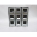 Galvanised set of nine small drawers