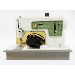 Hoover steam cleaner and a sewing machine (2)Condition ReportWe cannot confirm whether electronic