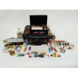 Vintage KLM suitcase and contents of assorted painting equipment including tin artist's box, ceramic