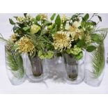Pair of large glass vases, three other modern glass vases with faux-flowers to include hydrangea,