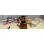 Two boxes of assorted mugs advertising Cadbury's chocolate to include Dairy Milk, Chocolate Buttons,