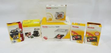 Kodak Easyshare zoom digital camera, a Kodak Easyshare printer dock, a Kodak digital camera