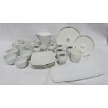 Seven boxes of assorted ceramics to include white M & S and Andante Square, ceramic mugs,