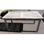 Teak garden table, 75cm high, 65 cm width, 151 cm in lengthCondition ReportRevised Measurements